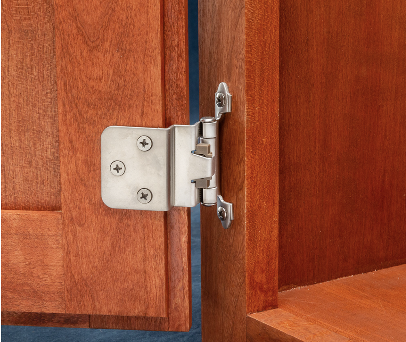 Surface-mounted hinge for kitchen cabinets