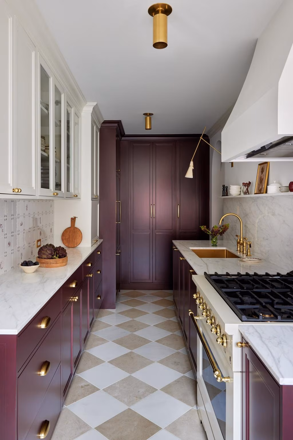Oxblood lacquer kitchen cabinetry by CooperBuild