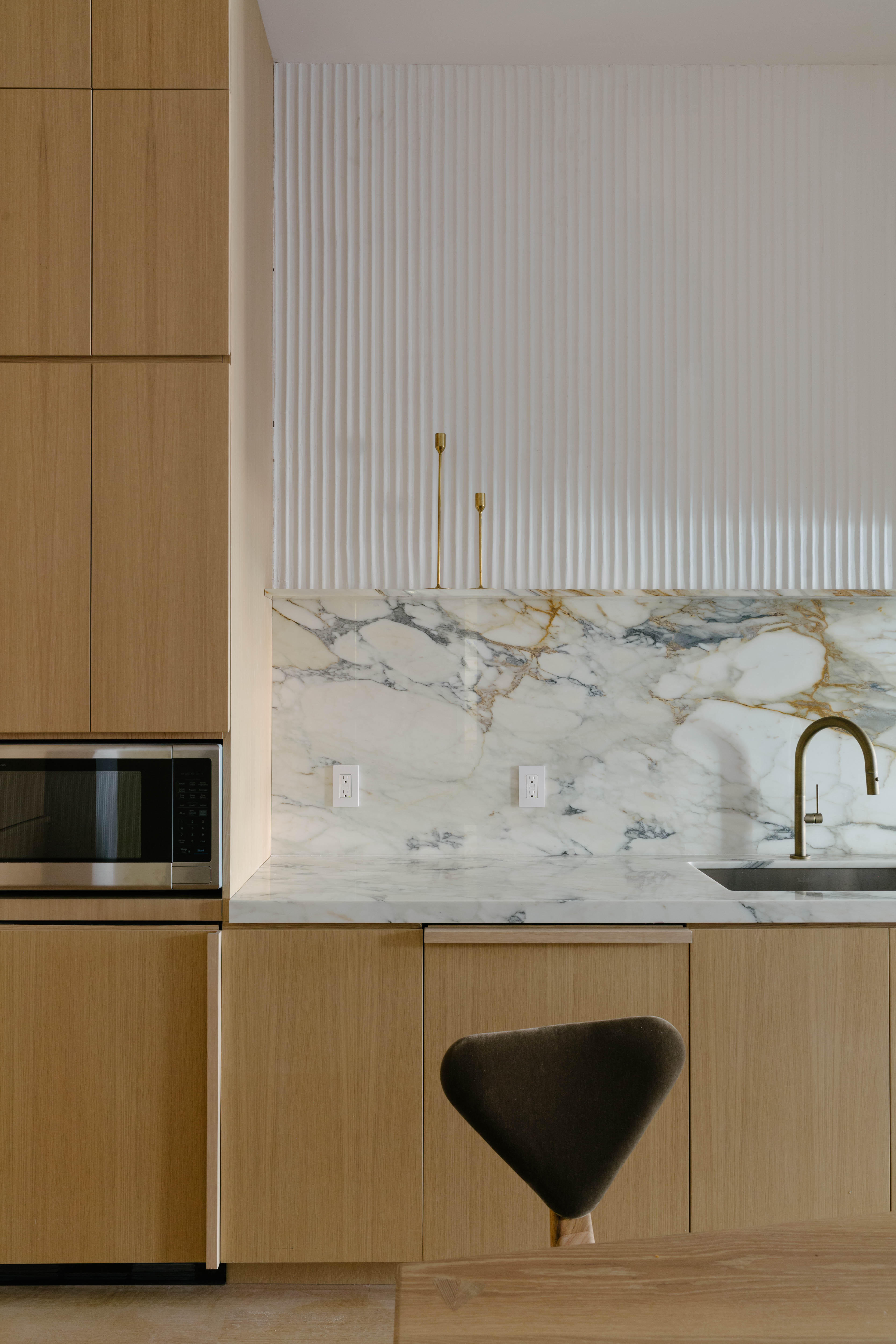 Custom millwork and kitchen cabinetry fabrication by CooperBuild's in-house workshop for NYC luxury homes