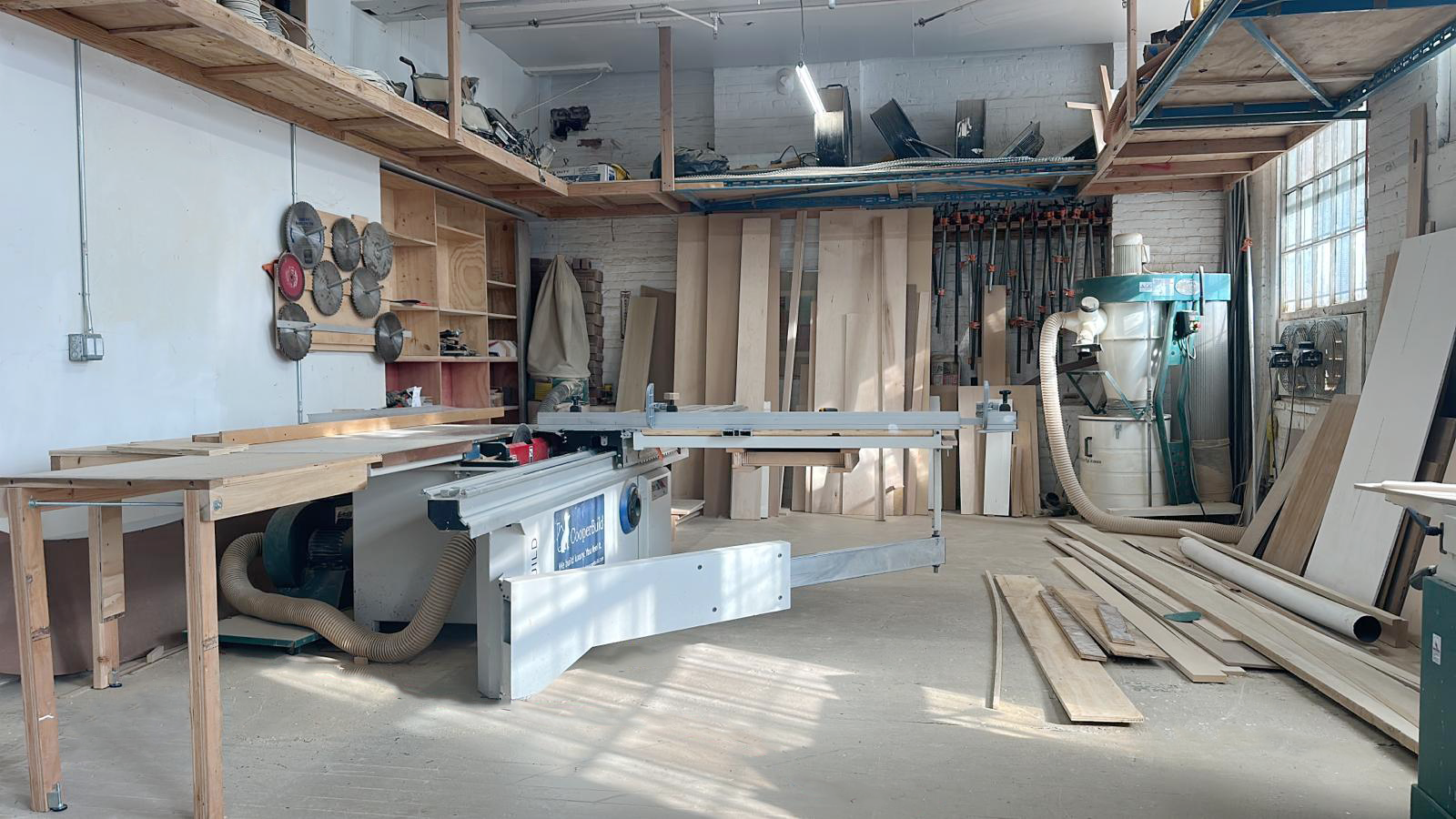 CooperBuild millwork shop facility in Yonkers, NY showing CNC routers and fabrication equipment